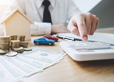 Financial preparation for eviction hearing in Travis County with money and calculator.